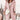 Oversized pink hooded sweater dress in a chunky knit, featuring long sleeves and a cozy fit, perfect for winter fashion in size 2XL.
