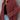 A wine red oversized women's corduroy shirt in size 3XL, featuring a burnt orange hue, styled as part of an autumn fashion ensemble. The shirt is paired with jeans, showcasing a casual yet fashionable outerwear option for the season.