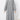 A woman wearing an oversized long gray hoodie dress made from a comfortable cotton blend, featuring long sleeves and a casual collar.