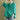 Oversized green sweater for women in size XL, featuring a casual cotton blend design with long sleeves and a comfortable fit.