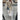 Oversized women's wool trench coat in a double-breasted design, featuring a classic collar and long sleeves. The elegant winter coat has a tailored waist and a stylish, sophisticated appearance.