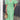 Green Linen V-Neck Wrap Dress worn by a mature woman, featuring a flattering waistline and elegant sleeve design, perfect for a chic summer look.