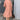 Women's peach mid-length spring dress with sleeves and a fitted waist, featuring a lightweight and elegant design suitable for casual wear.