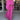 Pink boho skirt paired with an oversized sweater, showcasing women's spring fashion with a focus on bright magenta and pink hues.
