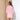 Pink corduroy A-line mini dress featuring ruffled sleeves, a collar, and a defined waist.