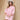Pink corduroy A-line shirt dress with ruffled sleeves, featuring a collar and a flattering mini length, shown in a rose color and size XL. The dress is styled with a sun hat.