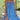 Pink floral sleeveless sundress with asymmetrical hem in blue, featuring a flowing design suitable for plus size, displayed on a mannequin with emphasis on shoulder and thigh areas.