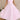 Pink halter neck backless tulle dress, worn by a smiling woman, ideal for weddings and summer events, showcasing a blend of elegance and style with its flowing one-piece design.