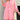 Pink linen oversized tunic dress on a mannequin, featuring a casual and breezy design suitable for summer streetwear. The dress is styled with sunglasses, highlighting a laid-back, fashionable look. The soft linen fabric and loose fit offer comfort and ease, perfect for warm weather.