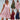 Sleeveless pink linen tiered mini dress with a V-neck design, suitable for summer fashion.