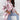 Pink plaid oversized shacket with a collared neckline and long sleeves, modeled by a woman. The shacket features a mix of white and pink hues, adding a trendy touch to casual outerwear.
