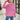 Pink textured ribbed sweater with a unique cut-out design, showcasing modern knitwear style, worn by a model paired with jeans.