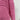 A pink textured ribbed sweater with a cut-out design, featuring long sleeves, shown on a person. The sweater has a modern knitwear style and is crafted from woolen material.