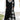 Plaid long-sleeve midi dress featuring a cowl neck and contrast hem, showcasing a blend of black and white patterns with a defined waist.