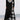 Plaid long-sleeve midi dress featuring a cowl neck and contrast hem, showcasing elements of outerwear with attention to shoulder and waist design, suitable for daytime fashion.