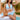 Plus Size Black Crochet Halter Bikini Set featuring a high-waisted design; displayed with a crochet halter swimsuit top paired with matching high-waisted bottoms.
