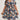 Plus size blue floral tropical print knee-length summer dress modeled by a woman.