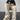 Polaroid Pattern Pants featuring a retro photo print design, styled as streetwear trousers. The pants are shown on a person, highlighting the fit around the waist, thighs, and knees.