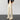 Retro-style streetwear trousers featuring a unique Polaroid pattern print, showcasing a blend of grey tones and stylish design elements. The pants have a comfortable fit around the waist and thighs, ideal for making a fashion statement.