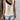 Women's polka dot contrast collar sleeveless summer blouse with chic fashion design.