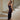 Purple floral lace backless floor-length evening gown with corset detailing, featuring elegant lacework, sleeveless design, and fitted waist.