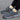 Gray lightweight breathable running sneakers for women shown in size 42, featuring a sleek design suitable for sportswear and outdoor activities.