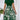 Red floral A-line skirt, part of a high-waisted women's fashion ensemble, featuring a vibrant floral pattern in red with green accents, suitable for day wear, displayed on a mannequin.