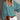 Red floral V-neck long sleeve women's casual blouse in bohemian style, displayed in green color, size 2XL.