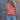 Red floral women's V-neck summer blouse with lightweight fabric and short sleeves, shown on a model wearing jeans.