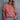 Woman wearing a red floral V-neck summer blouse with short sleeves, size 5XL, standing and smiling.