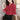A stylish red geometric print blouse with three-quarter sleeves, perfect for autumn fashion. The blouse features a classic tartan pattern and a comfortable fit, complementing the neck and shoulder area. The model is smiling, showcasing the blouse's appeal and versatility.