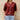 Women's red linen blouse in an XL size, featuring a V-neck and short sleeves, styled for summer wear.