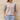 Gray linen blouse for women, featuring a V-neck and short sleeves.