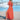 A red maxi beach dress with a side slit, featuring a lightweight fabric. The dress is worn by a person on a beach, showcasing its vibrant orange-red hue and comfortable fit. The dress has sleeves and a defined waistline, ideal for summer outings by the water.