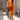Red multi-color abstract print bodycon midi dress with an asymmetric neckline, featuring shades of pink and orange, styled with fitted sleeves and a waist-hugging silhouette, suitable for a size XL.
