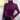 Violet ribbed turtleneck sweater shown in 2XL size, featuring a chic winter style paired with gold pearl hoop earrings.