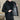 Reversible men's lightweight spring jacket in black, size 5XL, featuring an adjustable hood, sleek shoulder design, and tailored sleeves with a waist-length cut.