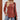 Ribbed women's tunic sweater in caramel, featuring a button knit design, styled with a casual fashion look and worn by a model in size 2XL.