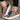 Rose Gold Glitter Platform Sneakers on a woman's feet, showcasing a trendy and stylish design perfect for parties. The sneakers are in a gold color and appear to be size 41, highlighting their fashionable and chic appeal.