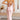 Elegant rust satin midi slip dress featuring a backless design with tie-back detail, highlighting the wearer's shoulders, neck, and waist.
