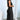 Sage green satin halter evening gown with an elegant backless design, showcasing a sophisticated formal dress style.
