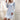 Silver ribbed long sleeve backless knit sweater dress for women, showcasing winter fashion with a focus on the textured knit pattern and elegant backless design.