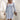 Silver ribbed long sleeve backless knit sweater dress for women, showcasing a chic winter fashion design with a fitted silhouette, high neckline, and stylish ribbed texture.