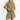 Woman wearing a sleeveless black romper with drawstring waist, posing with one hand on hip.