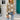 Blue and white crewneck sweater featuring a star pattern design, showcasing long sleeves and a casual knitwear style.