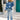 Blue and white star pattern crewneck sweater featuring long sleeves and casual knitwear design.