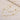 Sterling Silver Pearl Double Strand Choker from Effie Queen, featuring elegant pearls and intricate metalwork, displayed on a wooden background.