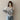 Striped crewneck sweater in black and white for women, featuring a loose fit pullover style with long sleeves and a comfortable fit around the shoulders and waist.