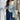 Women's black and white striped crewneck sweater with a loose fit, featuring long sleeves and a comfortable pullover design.