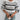 Striped crewneck women's sweater in black and white cozy knit fabric, featuring long sleeves and a comfortable fit, displayed on a mannequin or human model.